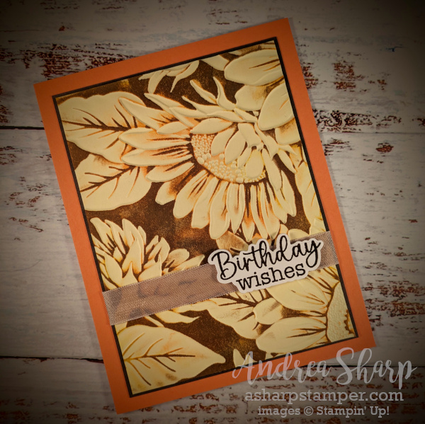 Birthday card with debossed sunflower image highlighted by background inking.